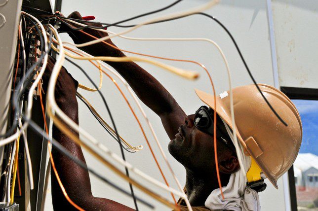 Electrician working on wires